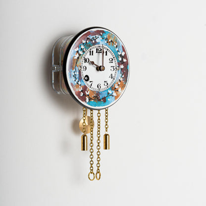 Wanduhr "Blütenkranz",  rund Ø 75 mm, Emailleschild, Siebentagewerk