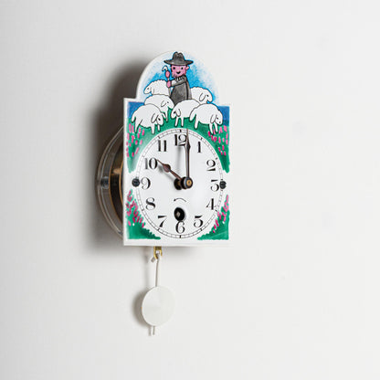 Wanduhr "Schäfer", Bogenschild aus Emaille, Maße: 50 x 75 mm, Eintagewerk
