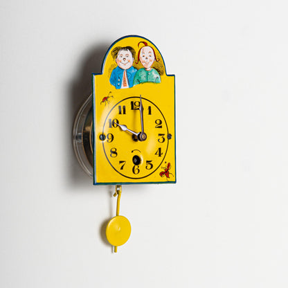 Wanduhr "Max & Moritz",  Bogenschild aus Emaille, Maße: 50 x 75 mm, Eintagewerk