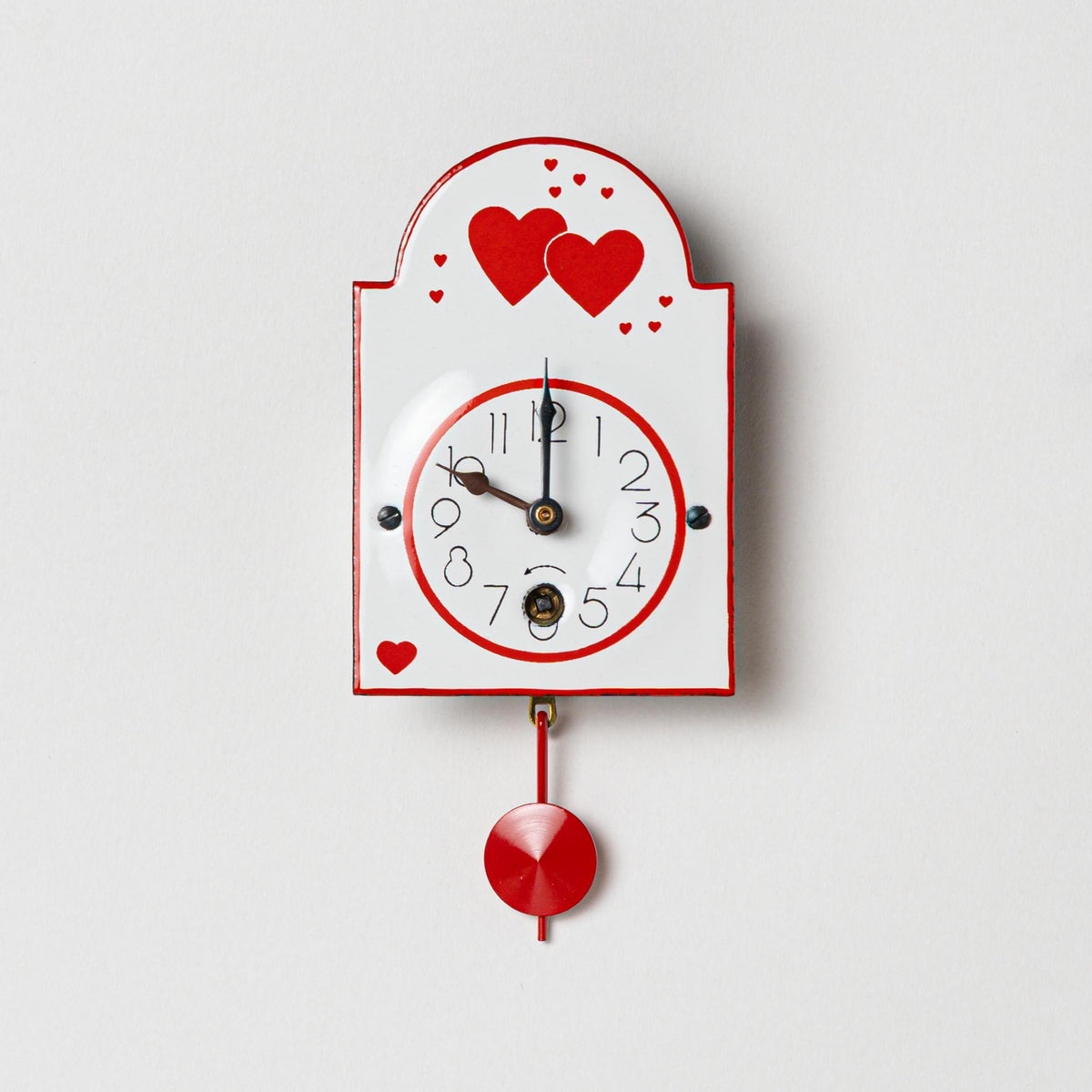 Wanduhr "Herzchen",  Bogenschild aus Emaille, Maße: 50 x 75 mm, Eintagewerk